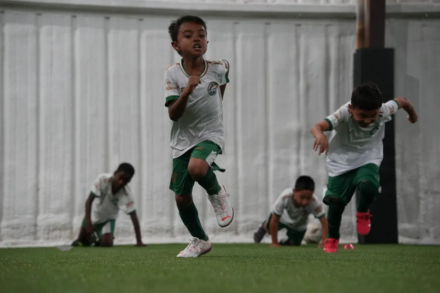 playing-kids-on-turf-field